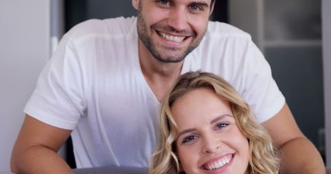 Happy Couple Embracing Domestic Bliss at Home