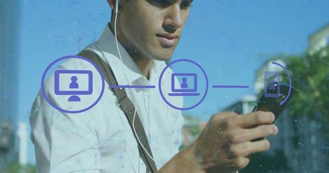 Commuter using smartphone with wired earbuds on sunny street connectivity icons overlay