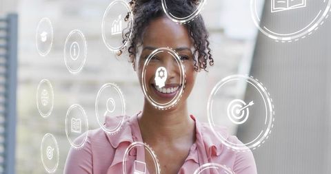 Smiling Clinician Wearing Stethoscope and Pink Blouse with Futuristic Medical HUD Overlay