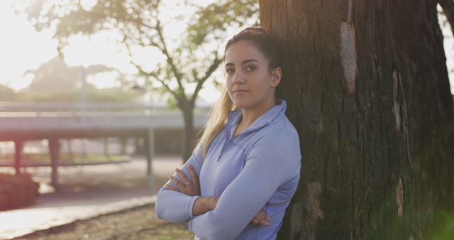 Confident Woman Standing in Park During Outdoor Exercise - Download Free Stock Images Pikwizard.com