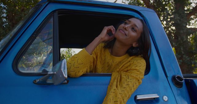 Happy Woman in Blue Truck Enjoying Nature - Download Free Stock Images Pikwizard.com