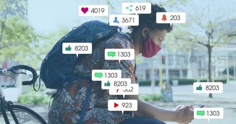 Man sitting with smartphone surrounded by bustling social media icons overlay