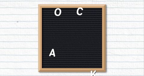 Educational letter board with school items on lined paper