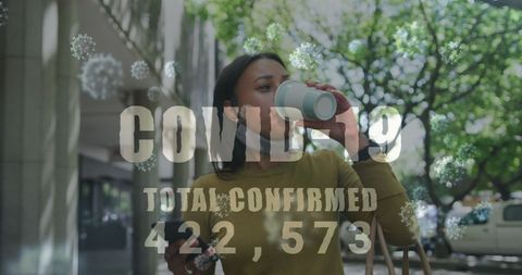 COVID-19 Awareness with Woman Outdoors Featuring Digital Display of Statistics