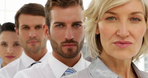 Confident Business Team Focused on Success in Office