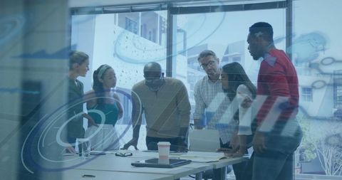 Diverse Team Analyzing Financial Data Behind Futuristic Screen - Download Free Stock Images Pikwizard.com