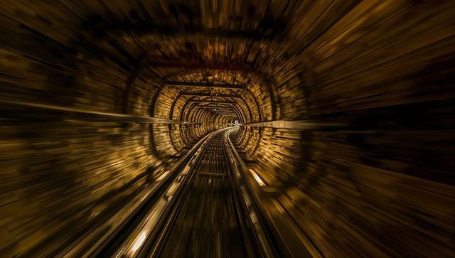 Futuristic Rails Shooting Through Underground Tunnel