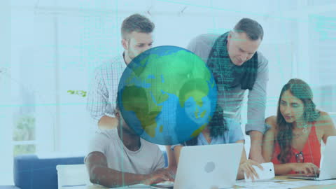 Diverse Colleagues Collaborating in Technology-Driven Workspace