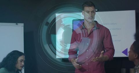 Man Presenting Holographic Display in Modern Office Meeting