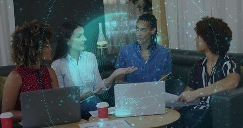 Innovative team discussion with holographic technology in modern office