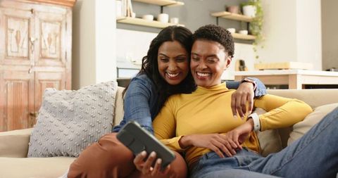 Multicultural Friendship: Happy Women Taking Selfie at Home