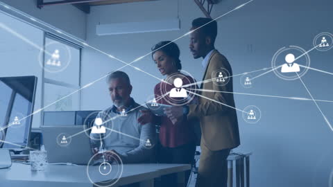 Diverse Office Team Analyzing Digital Network Collaborations