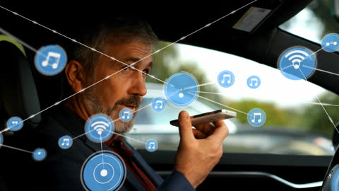 Man Using Smartphone for Connected Car Communication