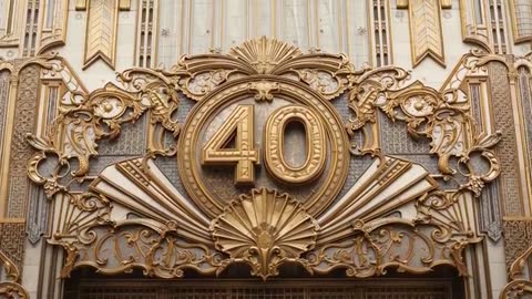 Gilded Art Deco 40 Medallion Entrance Revealing Fan Motif and Ornate Scrollwork in Motion