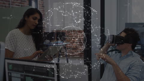 Business Professionals Engaging with Virtual Reality in Modern Workspace