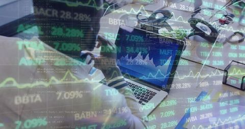 Businessman Analyzing Financial Data Using Laptop Amid COVID-19 Pandemic