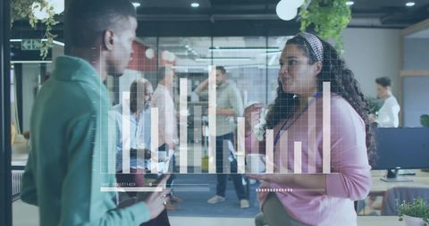 diverse team engaging with digital financial data in modern office - Download Free Stock Images Pikwizard.com