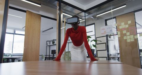 Businesswoman Engaged with Virtual Reality at Modern Office