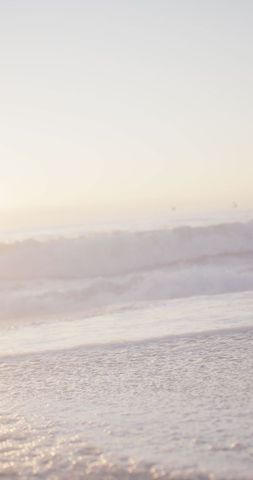 Tranquil Coastal Waves under Sunlit Sky - Download Free Stock Images Pikwizard.com