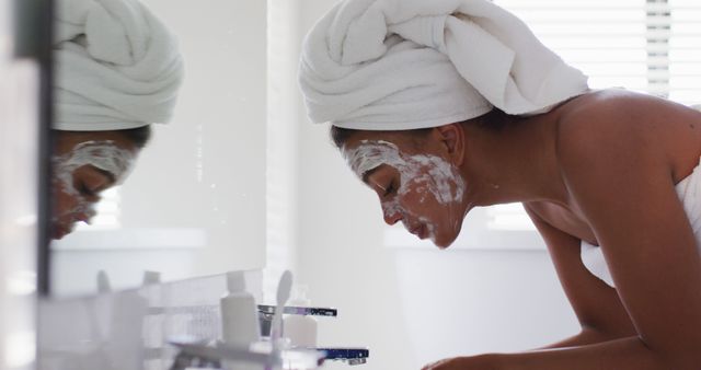 Woman Skincare Routine in Bathroom Wearing Towel Head Wrap - Download Free Stock Images Pikwizard.com