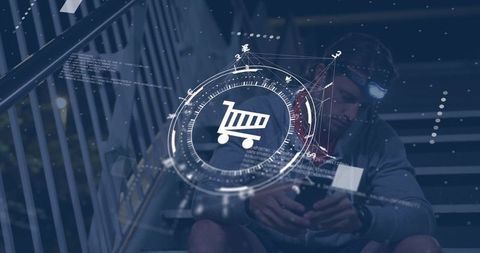 Sitting man holding smartphone on stairwell using augmented reality shopping hud overlay