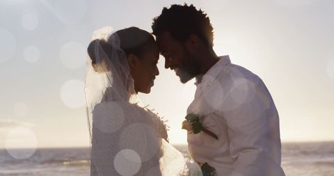 Joyful Embrace of Newlyweds on Sunny Beach - Download Free Stock Images Pikwizard.com