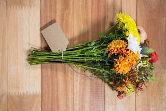Colorful Flower Bouquet on Wooden Background - Download Free Stock Photos Pikwizard.com