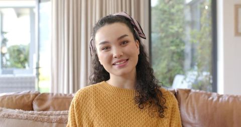 Relaxed Woman at Home in Cozy Sweater with Headband