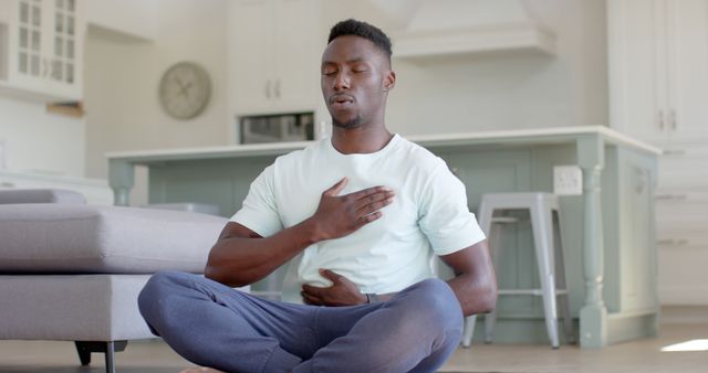 Young African American Man Practicing Meditation at Home - Download Free Stock Images Pikwizard.com