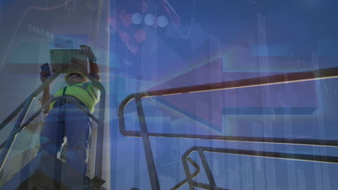 Caucasian Worker Using Tablet by Wind Turbine and Data Graphics Overlay