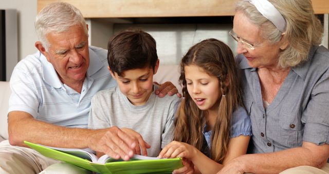 Grandparents Reading Story to Happy Grandchildren at Home - Download Free Stock Images Pikwizard.com