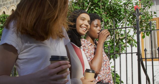 Diverse Group of Friends Enjoying Coffee Outdoors - Download Free Stock Images Pikwizard.com