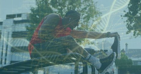 Athlete stretching in urban park with dna technology overlay