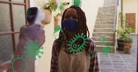 Pandemic safety: woman taking temperature amid digital virus icons