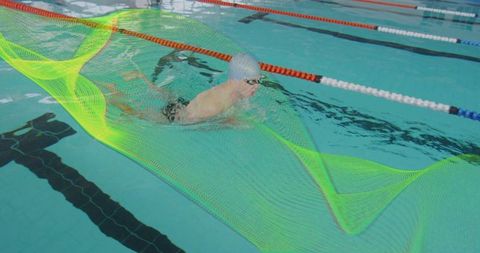Dynamic Male Swimmer in Pool with Futuristic Neon Mesh Effect