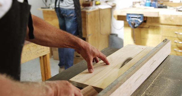 Workshop Craftsman Using Table Saw to Cut Wood - Download Free Stock Images Pikwizard.com