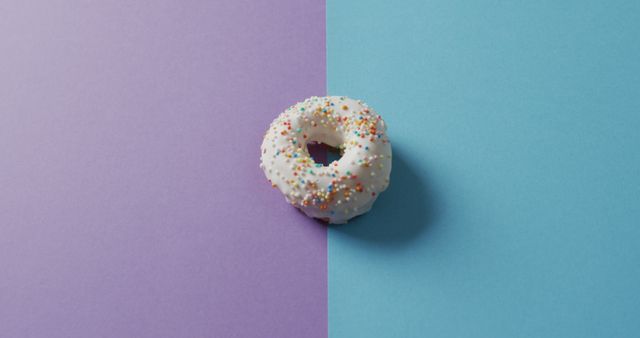 Delicious Donut with Sprinkles on Dual-Color Background - Download Free Stock Images Pikwizard.com