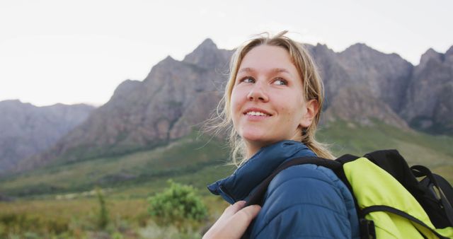 Young Woman Hiking in Mountain Landscape at Sunset - Download Free Stock Images Pikwizard.com