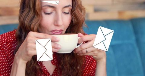 Young woman exploring social media with virtual email icons