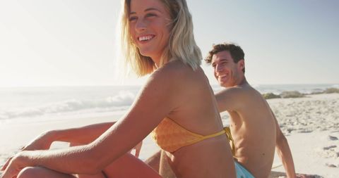 Happy Couple Relaxing on Relaxing Beach Day - Download Free Stock Images Pikwizard.com
