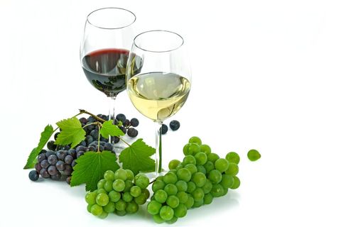 Elegant Red and White Wine with Fresh Grapes
