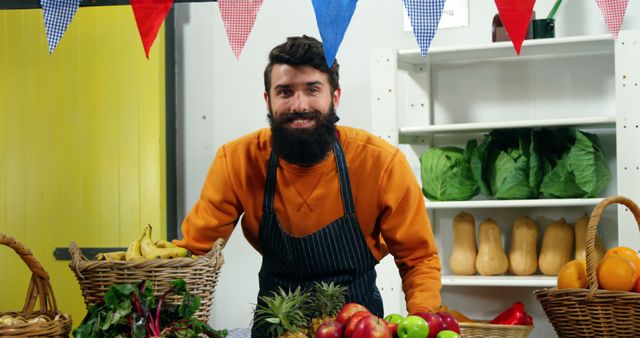 Male staff working at vegetable counter in supermarket