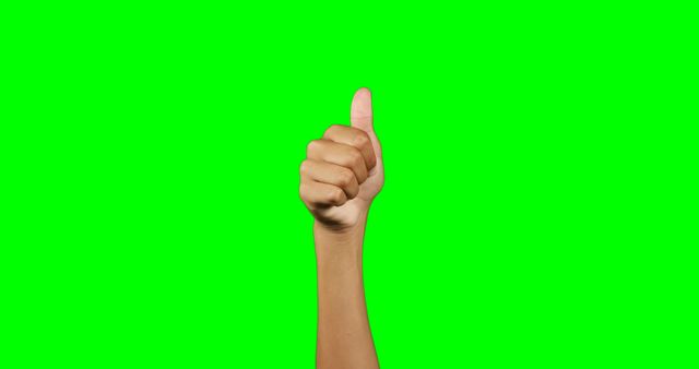 Hand showing thumbs up gesture with bright green background - Download Free Stock Images Pikwizard.com