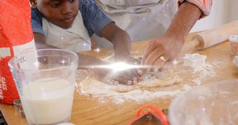 Father and Son Bonding Through Baking with Hands in Dough