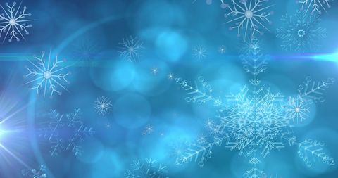 Floating Snowflakes on Dreamy Blue Bokeh Background - Download Free Stock Images Pikwizard.com