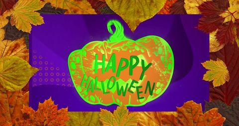 Happy halloween jack-o'-lantern surrounded by autumn leaves