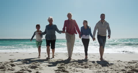 Multigenerational Family Enjoying a Sunny Day on the Beach