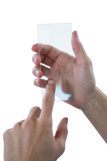 Hand interacting with a futuristic transparent mobile phone. Ideal for technology, innovation, and future communication concepts. Useful for illustrating advancements in mobile devices, digital interfaces, and high-tech gadgets.