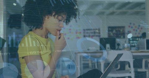 Focused Businesswoman Analyzing Data for Trends and Insights