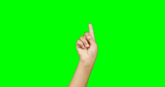 Close-up of Child Hand Pointing Index Finger on Green Background - Download Free Stock Images Pikwizard.com